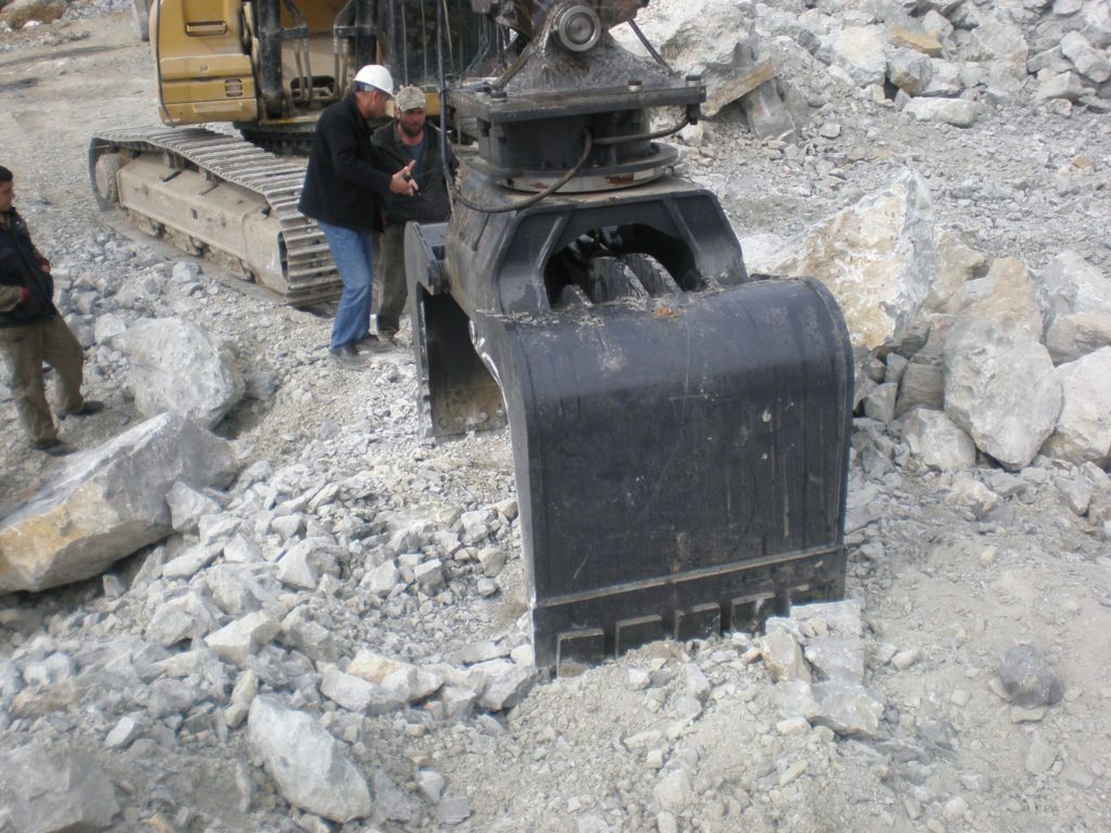 Rock Grapple Handling and Compact Attachments